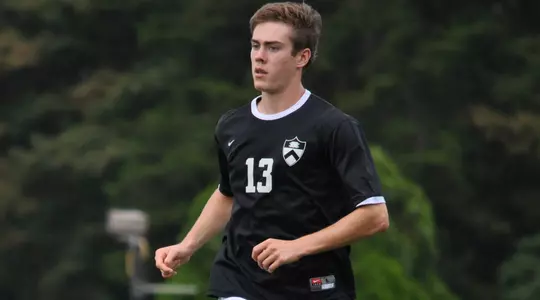 A Pair of Men's Soccer Players Featured