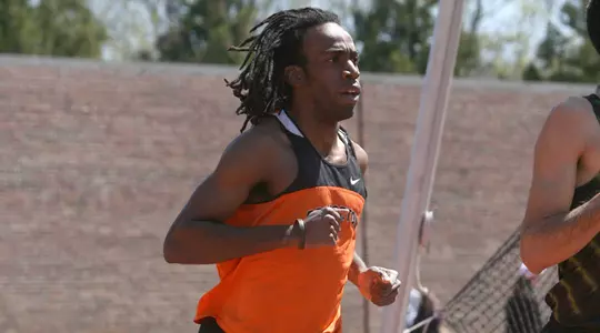 Dinkins wins 800 and Hollimon Second in Hurdles at Larry Ellis Invite