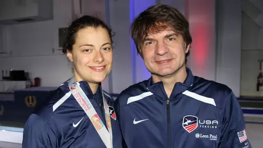Holmes with head coach Zoltan Dudas.