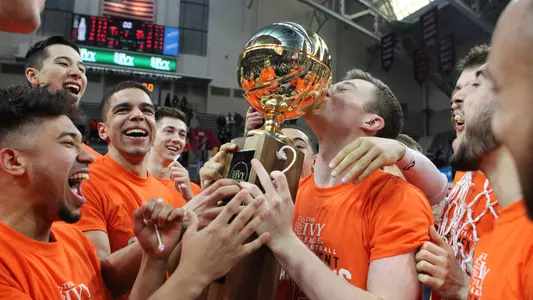 Spencer Weisz with the Ivy League Tournament trophy.
