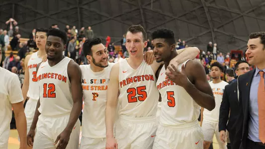 Myles Stephens (12), Elias Berbari, Steven Cook (25) and Amir Bell (5) after the win.