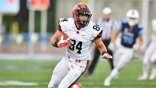 Stephen Carlson runs with the ball after a catch against Columbia.