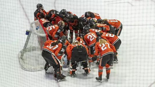 Princeton women's ice hockey huddle at Cornell