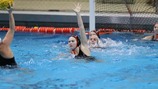 Action of CiCi Stewart of the women's water polo team.