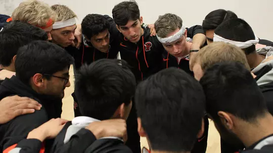 men's squash huddle
