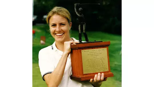 Julia Allison, Class of 2001, with the Ivy League women's golf championship trophy