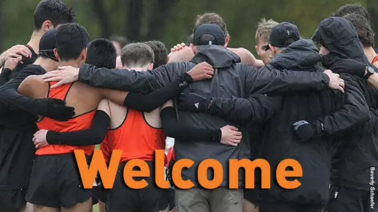 men's cross-country huddle with welcome text