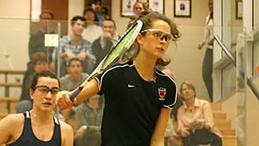 Women's squash action photo