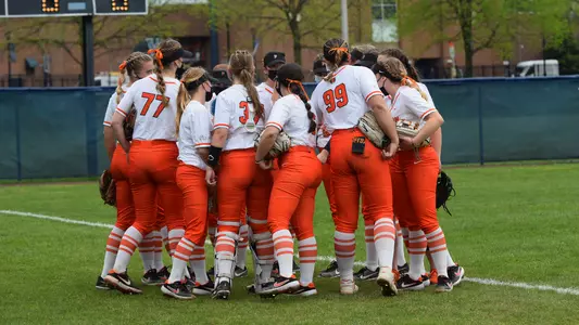 Princeton softball players huddle