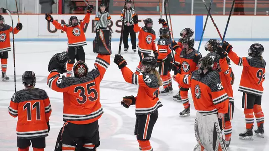 women's ice hockey team in postgame circle