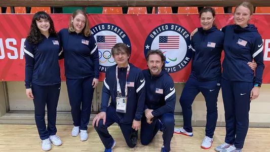 From left, incoming freshman Maia Weintraub, Eliza Stone '13, head coach Zoltan Dudas, assistant coach Oleg Stetsiv, Katharine Holmes '17 and Anna Van Brummen '17 are the Princeton-connected fencers for Team USA in Tokyo.