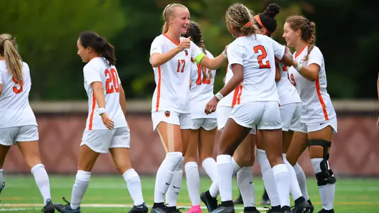 women's soccer group celebration photo
