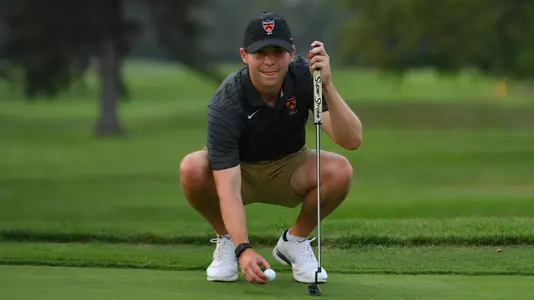 Sam Clayman lines up a putt