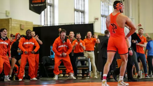 wrestling team celebrates luke stout win