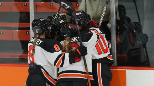 women's hockey team celebration huddle