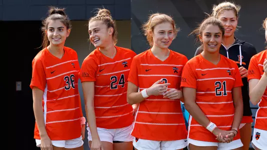 princeton players watch the game from the sideline
