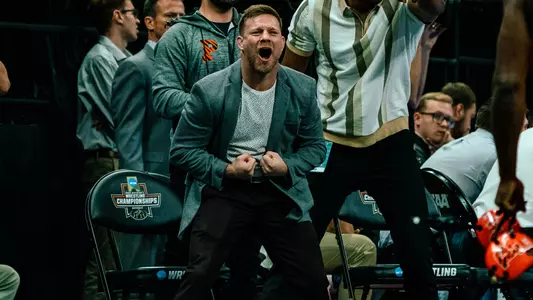 Joe Dubuque coaching action photo