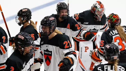 group of princeton women's hockey players on the ice