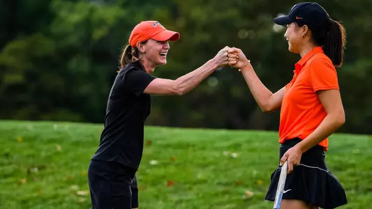 Erika DeSanty congratulates Caris Kim