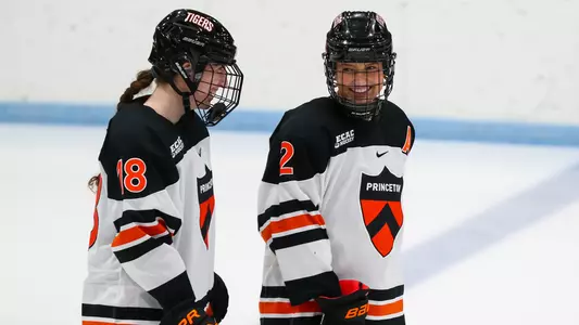 Issy Wunder and Mariah Keopple smile pregame