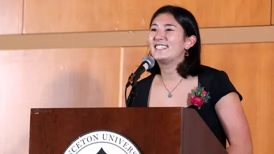 Serena Starks speaks at a podium