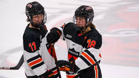 Shannon Griffin and Sharon Frankel smile on the ice