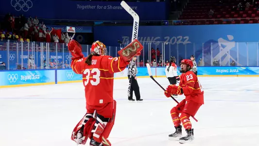 Kim Newell (left) celebrates win over Japan