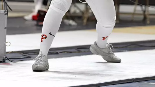 Princeton fencer with logo