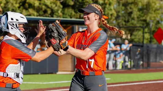 Alexis Laudenslager hi-fives teammate Sophia Marsalo.