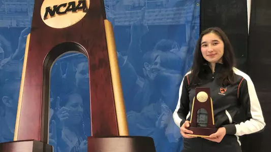 Maia Chamberlain with NCAA individual championship trophy