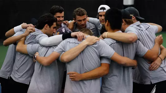 MEN'S TENNIS HUDDLE