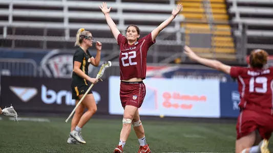 Olivia Hompe celebrates scoring the game winning goal to win the broze medal at the World Championships