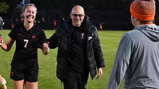 Mike Poller celebrates Ivy League win