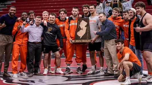 mac-ivy rivalry trophy photo with team