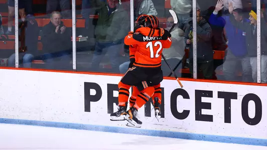 Tyler Rubin and Ian Murphy celebrate overtime winner against Brown