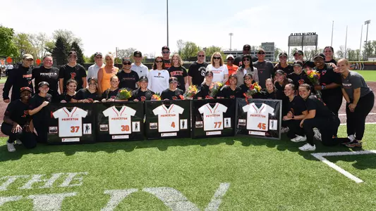 senior class recognition posed photo with team and family