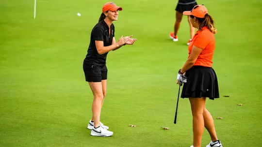 Erika DeSanty claps for Sophie Zhang-Murphy