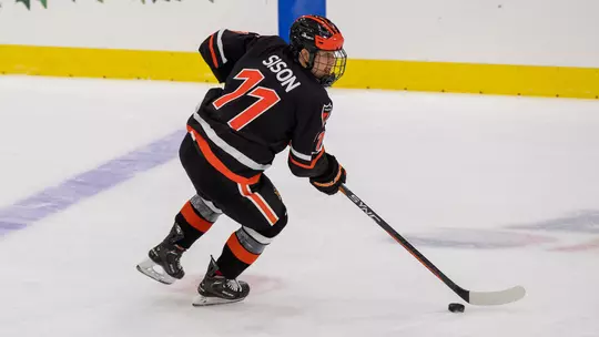 Sison has the puck