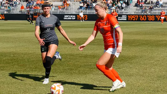 Ava Seelenfreund (Brown) battles Morgan Wiese (Princeton) for the ball