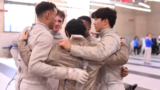 men's fencing huddle photo