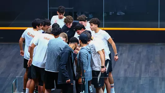men's squash huddle photo