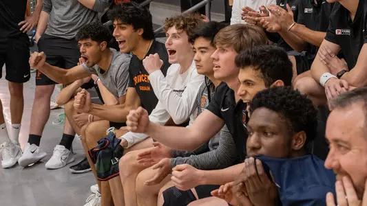 men's squash players react to a match