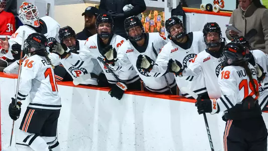women's hockey bench congratulations