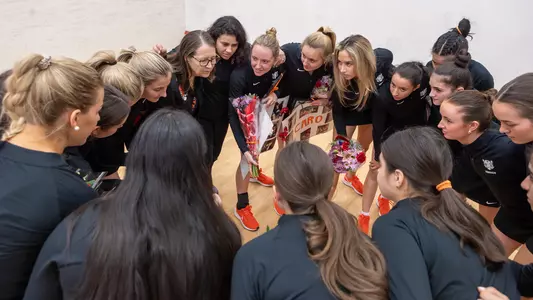 women's squash huddle