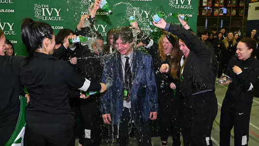 women's fencing douses Zoltan Dudas with water