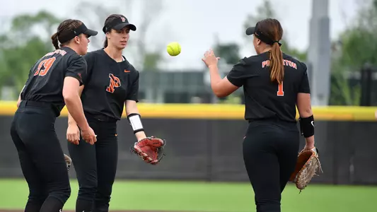 Princeton softball players gather at the circle