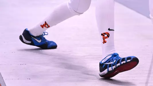 fencers shoes/socks in action on fencing strip
