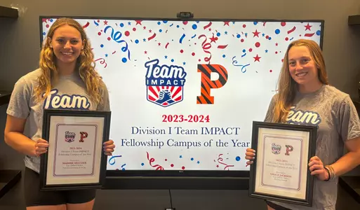 maddie seltzer and grace jackson with team impact awards