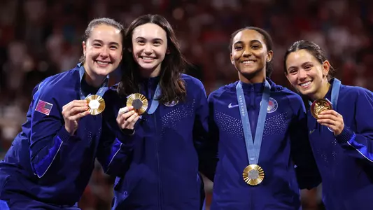 maia Weintraub medal photo with us teammates