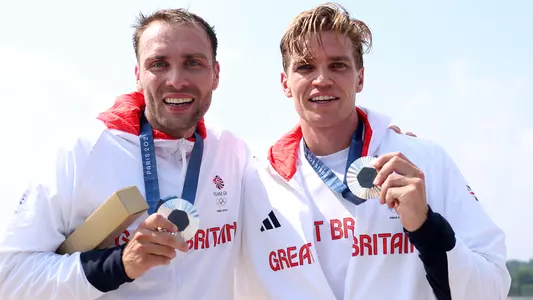 Tom George (right) with Olympic silver medal